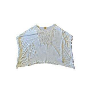 Women’s white poncho style top